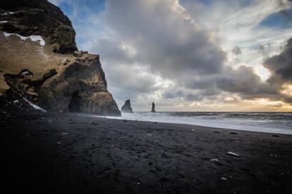 Enjoy the black sand beaches
