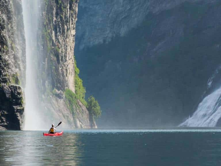 Kayak The UNESCO-Listed Geirangerfjord in Europe tour packages from Delhi
