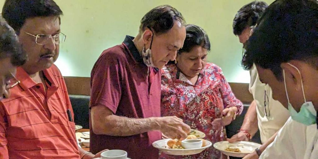 Passengers enjoying indian food on flamingo tours